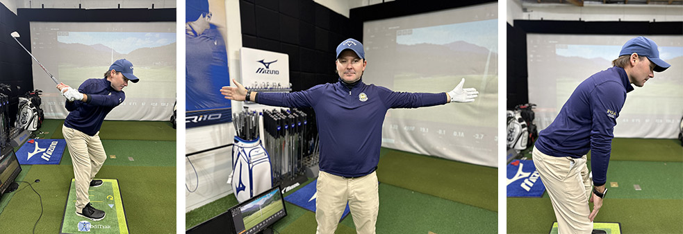 A golf instructor in a blue shirt and khaki pants demonstrates golf stances and arm positions indoors, with golf equipment and a large screen in the background.